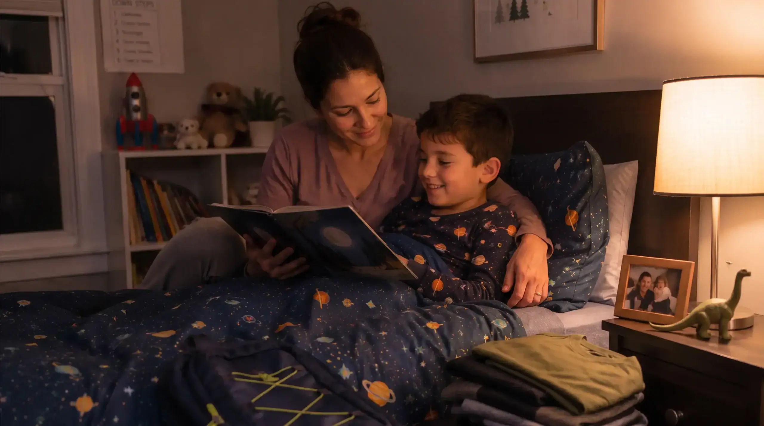 Parent and special needs child following a visual morning routine checklist before school