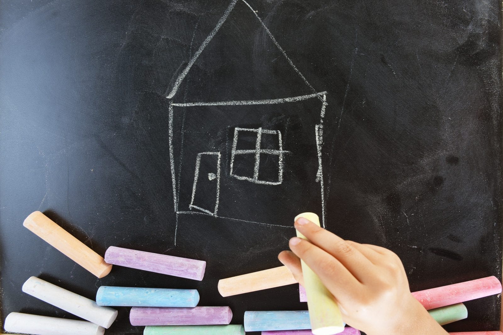 a home drawing in chalkboard