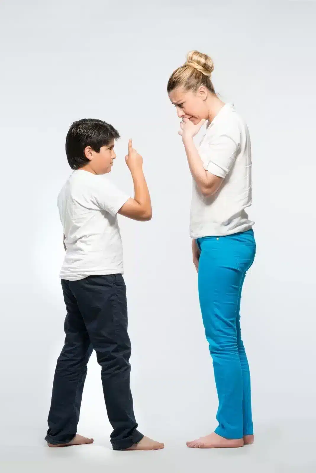 Child angry to her mother and pointing her finger to make her mother shut up