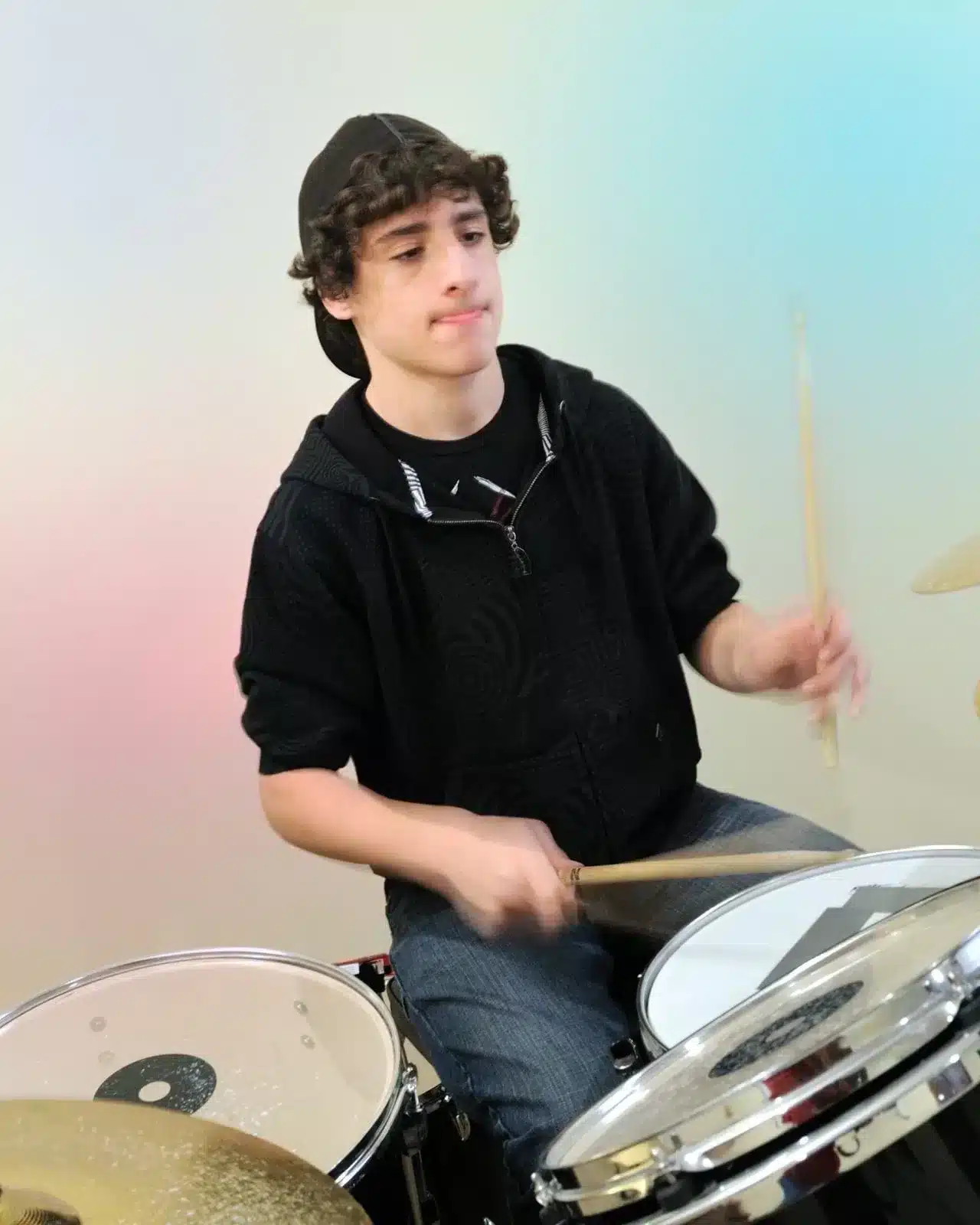 Boy playing the drum boxes