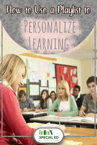 Teacher sitting at her desk in front of her classroom full of students using a playlist to personalize learning. 