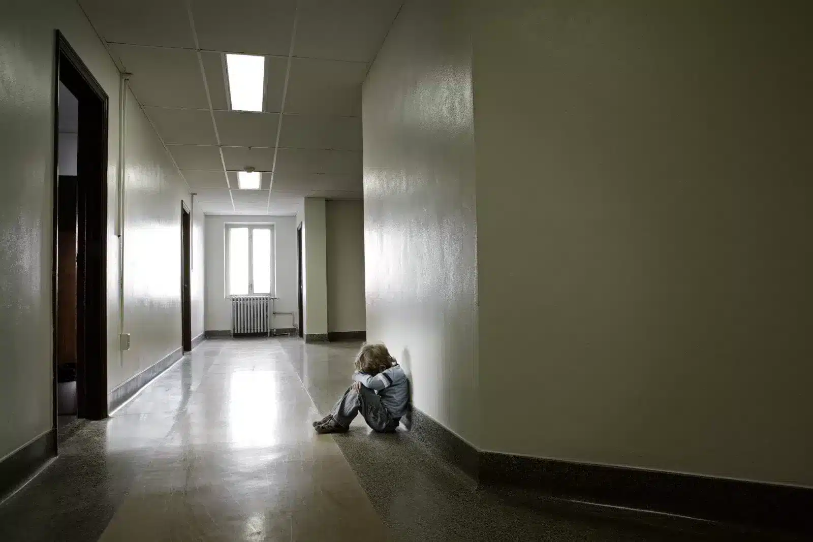 Boy-alone-in-a-hallway