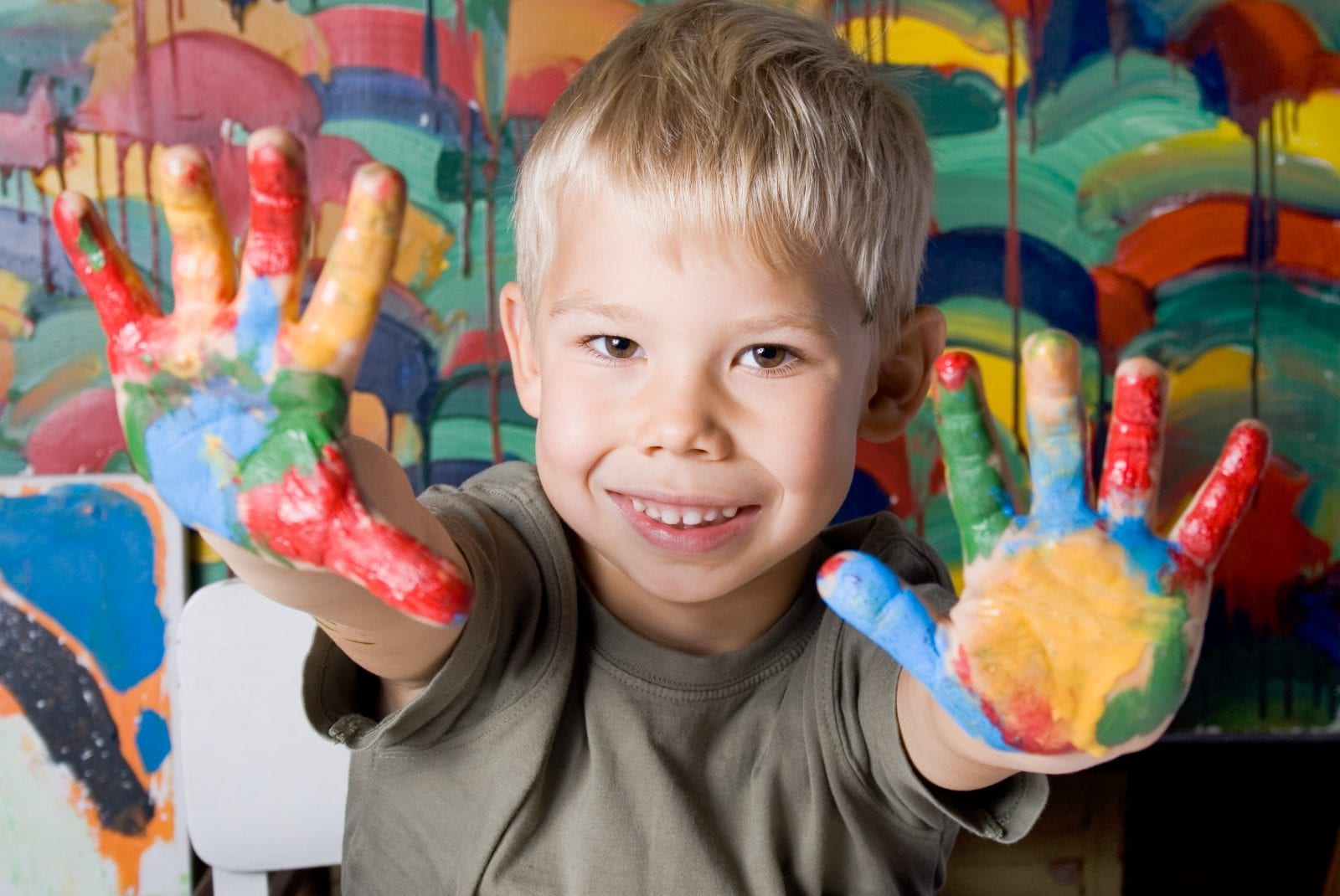 Boy with paint on hands