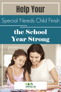 A mom and her daughter working on a school year memory book one of the ideas to help your special needs child finish the school year strong.