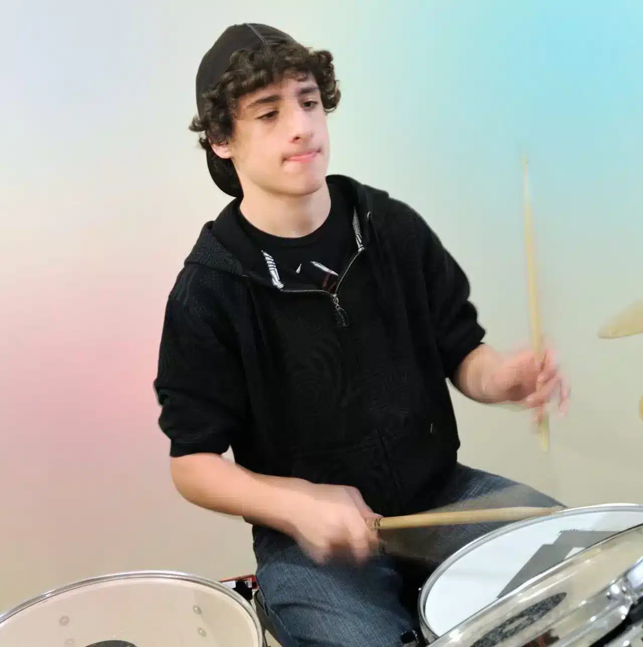 Boy playing the drum boxes