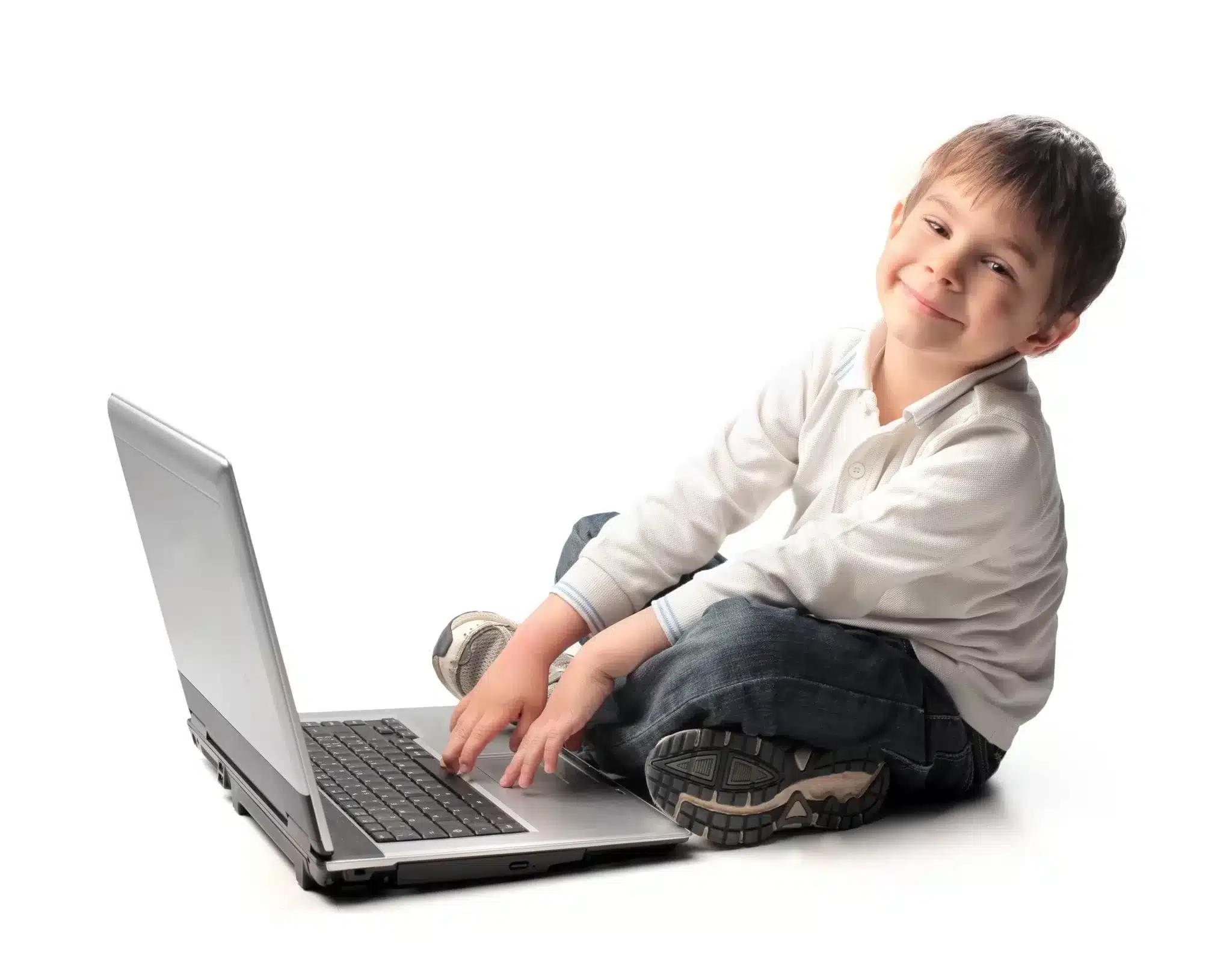 Happy child using laptop