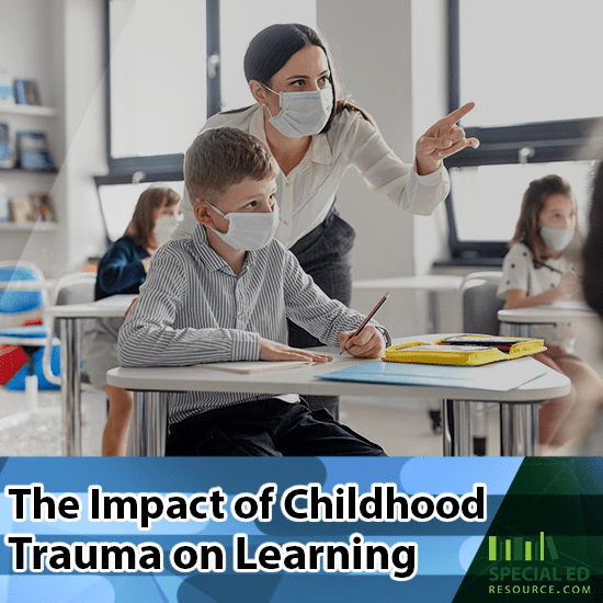 Teacher giving a student extra help in the classroom after realizing the impact of childhood trauma on learning.