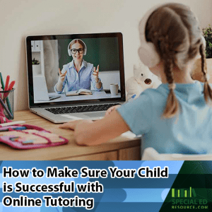 Young girl sitting at her laptop at home having an online tutoring session.
