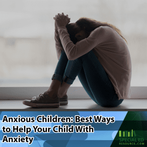 Young female child with anxiety hugging her knees with her head down what many anxious children do when they are overwhelmed with fear.