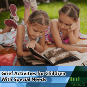 Two young girls laying on a blanket in the grass outside looking at photo albums trying one of these 31 Grief Activities for Children With Special Needs.