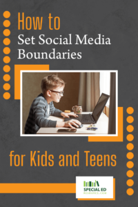 A young boy with glasses focused on using a laptop at a desk, with a mug and smartphone nearby, using the social media boundaries for kids his parents established from the tips in this blog post by https://specialedresource.com/