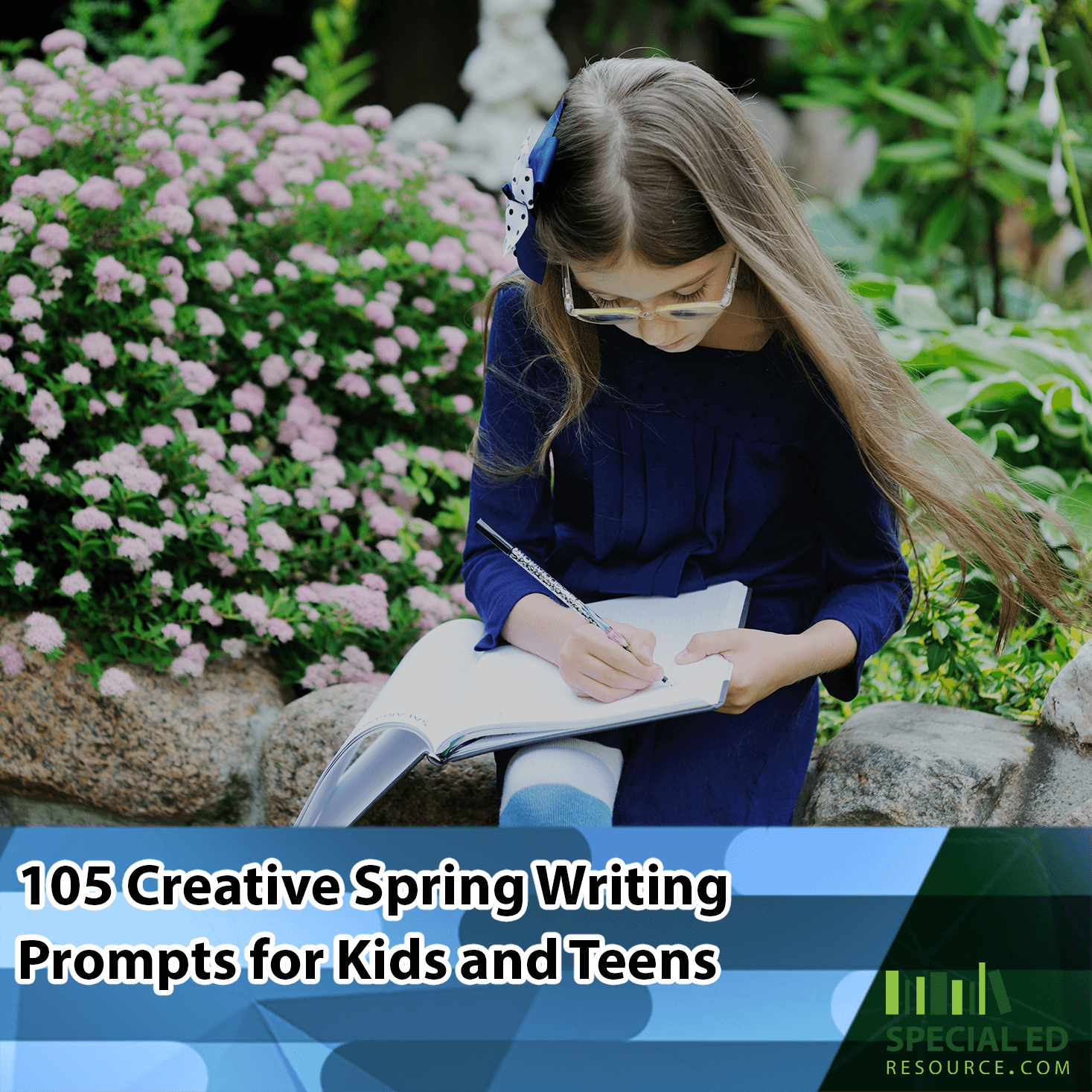 A young girl in a blue dress and glasses, intently writing one of these spring writing prompts for kids in a journal while sitting in a garden blooming with pink flowers.